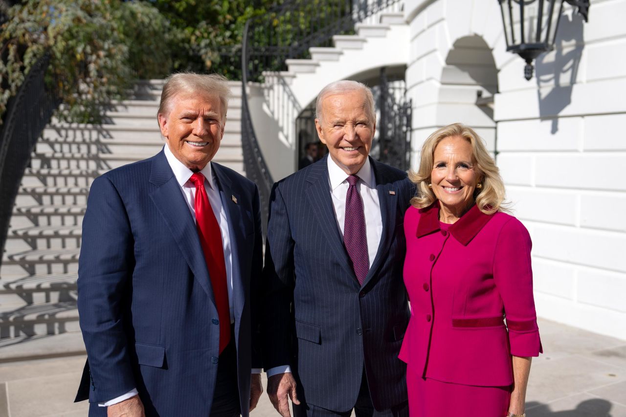 Biden and first lady Jill Biden greet Trump outside the White House in this handout photo.