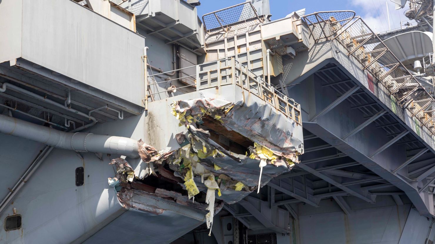 This photo from the US Navy shows the exterior damage of USS Harry S. Truman following a collision with merchant vessel Besiktas-M while operating in the vicinity of Port Said, Egypt.