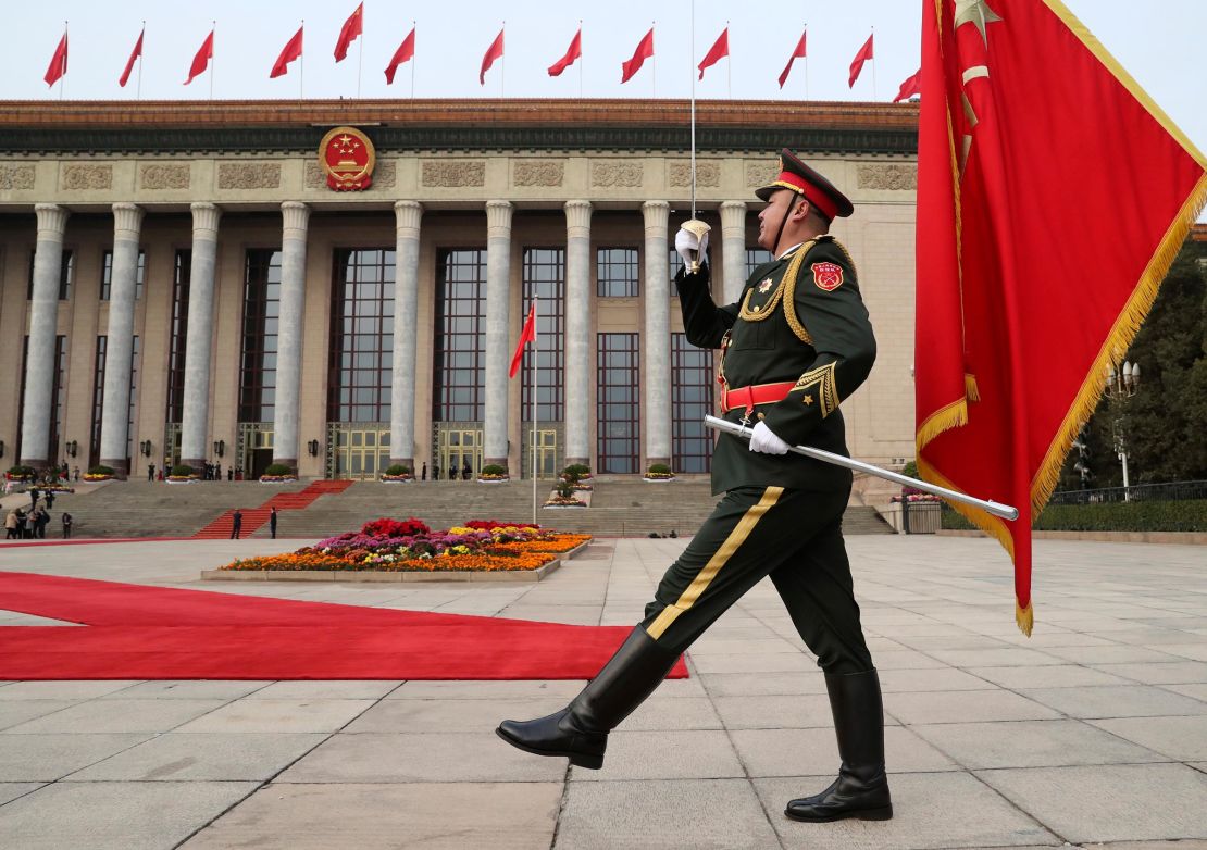 In this November 2017 photo, a member of the Chinese military marches before the welcoming ceremony for President Donald Trump and Chinese President Xi Jinping at the Great Hall of the People, in Beijing, China.