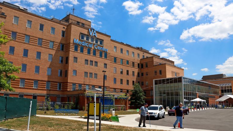 In this July 14, 2020 photo, people walk outside the Louis A. Johnson VA Medical Center in Clarksburg, West Virginia.
