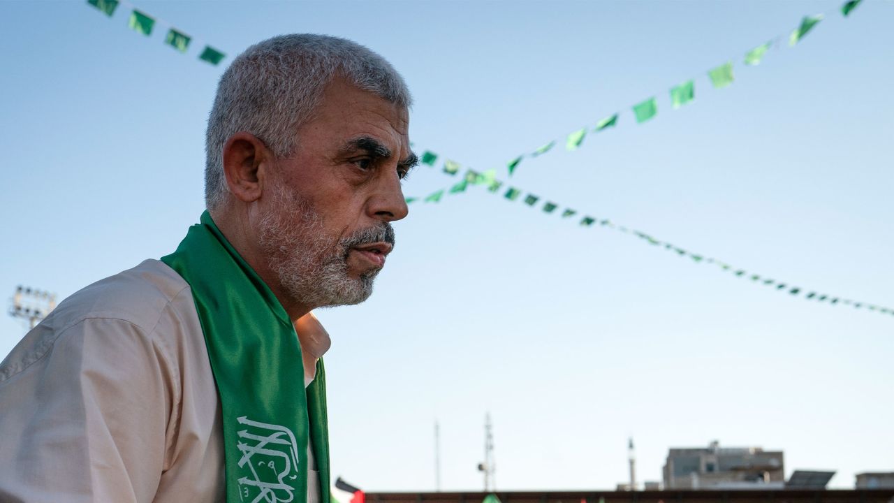 Hamas' leader Yahya Sinwar greets supporters at a rally in May 2021.