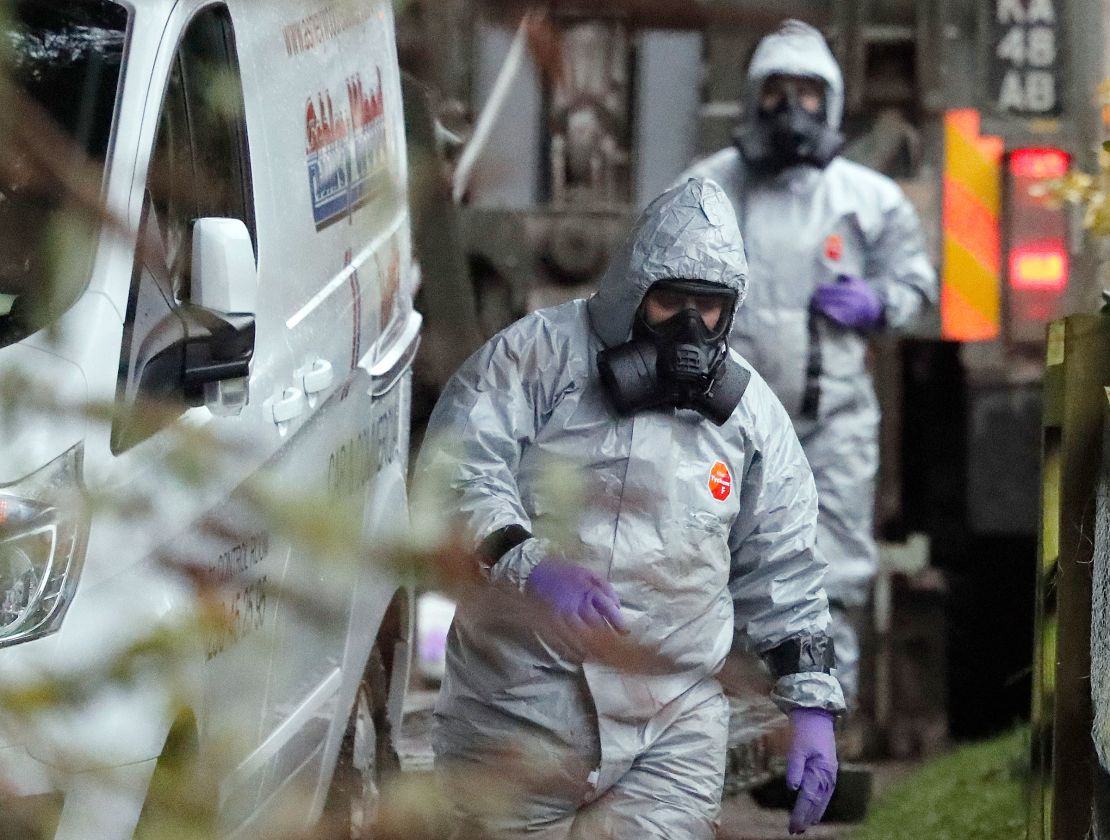 Personnel in protective gear investigate the nerve-agent poisoning of Russian ex-spy Sergei Skripal and his daughter Yulia, in Salisbury, England, in this 2018 file image.