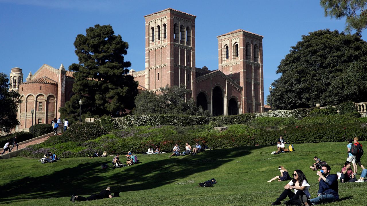 In this 2019 photo, students sit on the lawn near Royce Hall at the University of California, Los Angeles.