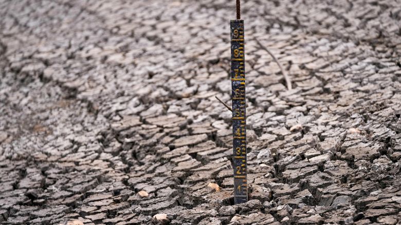 A water level marker stands in the San Rafael reservoir, a source of drinking water for Bogota and low due to the El Niño weather phenomenon, in La Calera, on the outskirts of Bogota, Colombia, on Monday, April 8.