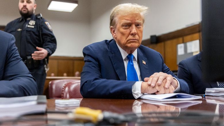 Former President Donald Trump awaits the start of proceedings during jury selection at Manhattan criminal court, on Thursday, April 18 in New York.