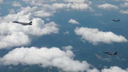 In this photo provided by the South Korea Defense Ministry, US Air Force B-1B bomber, left, and South Korean fighter jets F-15K fly over the Korean Peninsula during the joint aerial drills between South Korea and the United States on June 5.
