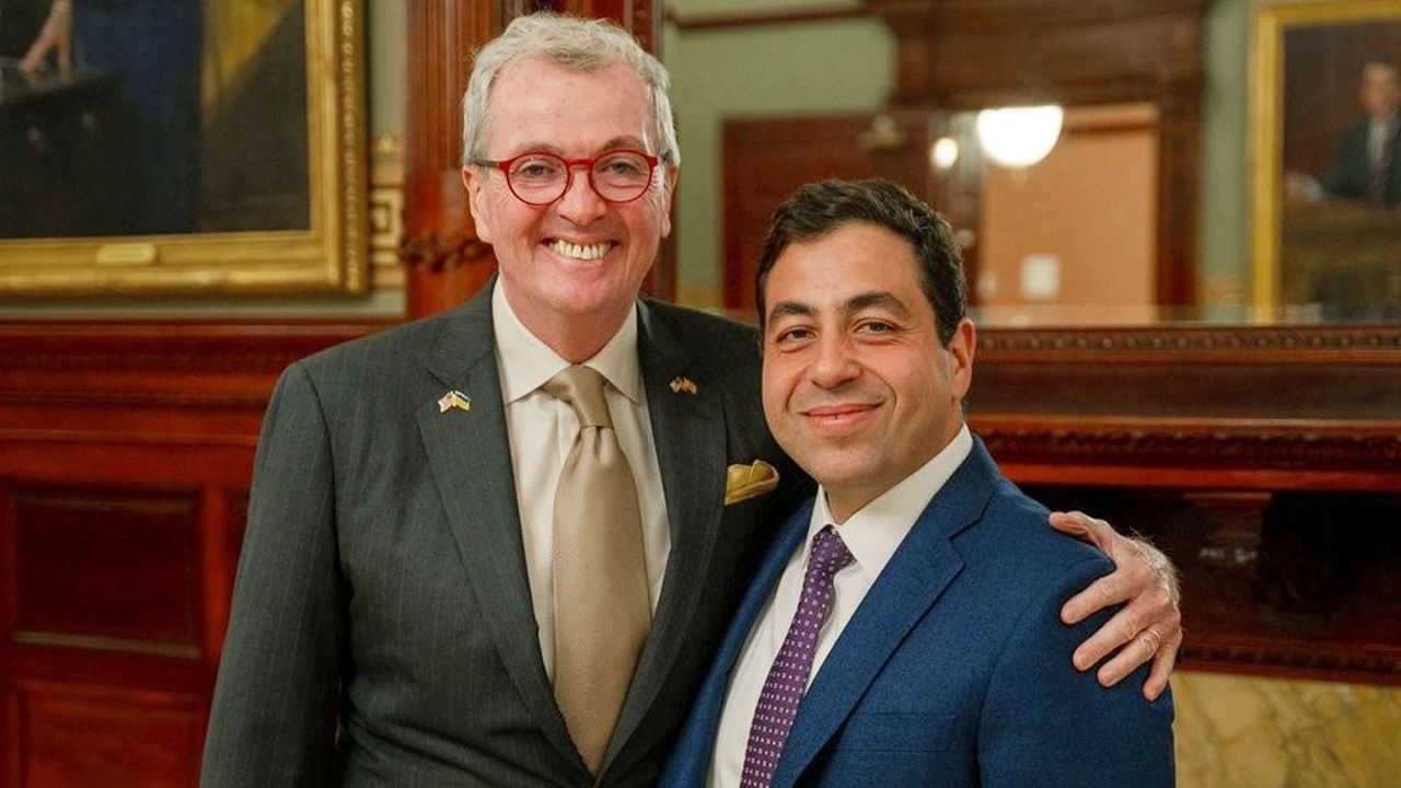 This photo, from the Office of the New Jersey Governor, shows Gov. Phil Murphy, as he announced the departure of his longtime Chief of Staff George Helmy, right, Sept. 22, 2023.