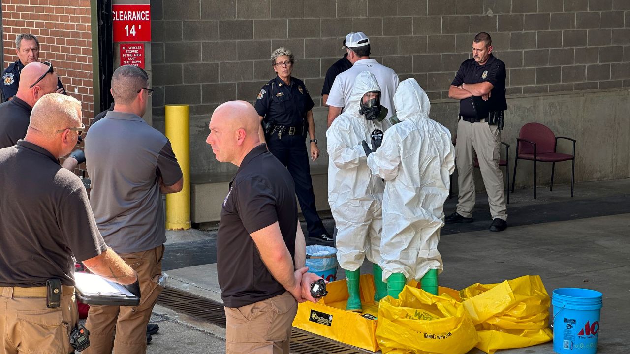 A hazmat crew from the National Guard's Civilian Support Team investigates after a suspicious package was delivered to election officials at the Missouri Secretary of State's Jefferson City, Missouri, office on Tuesday, September 17.