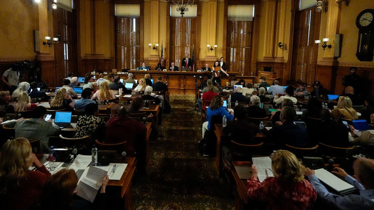 Georgia's State Election Board members discuss proposals to a full room for election rule changes at the Georgia State Capitol in Atlanta on September 20.