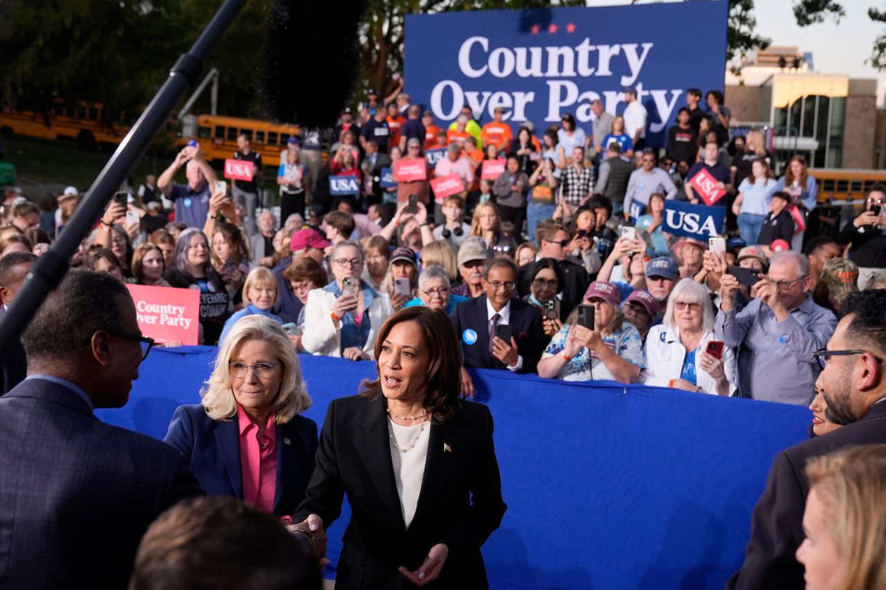 Vice President Kamala Harris, right, and former Congresswoman Liz Cheney greet attendees during a campaign event at Ripon College in Ripon, Wisconsin, on Thursday, October 3.