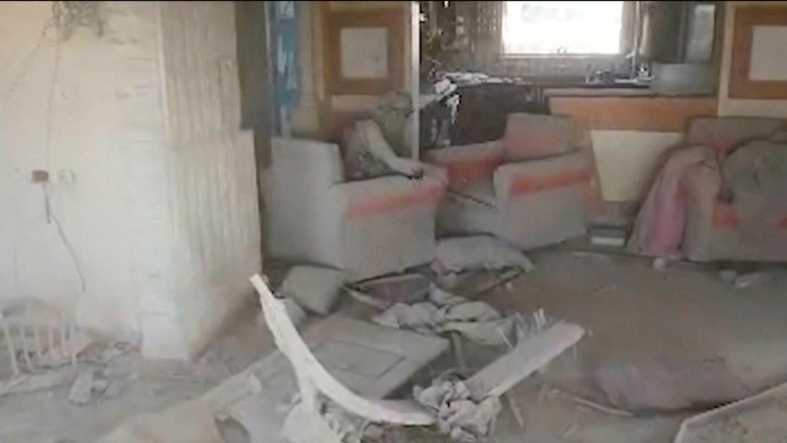 This still image from a video provided by the IDF shows a damaged building with a person the IDF claims is Shinwar. The man's face is hidden and he was seen sitting alone in Rafah, Gaza Strip, on Wednesday, October 16th.