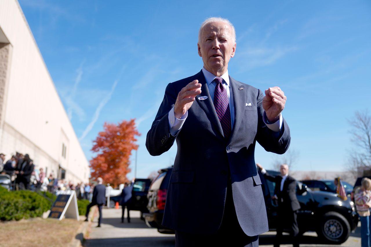 President Joe Biden speaks with reporters after casting his early-voting ballot for the 2024 general elections on October 28 in New Castle, Delaware.