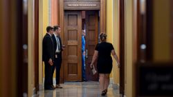 President-elect Donald Trump's nominee to be attorney general, former Rep. Matt Gaetz, closes a door to a private meeting with Vice President-elect JD Vance and Republican Senate Judiciary Committee members at the Capitol in Washington, DC, on November 20. 