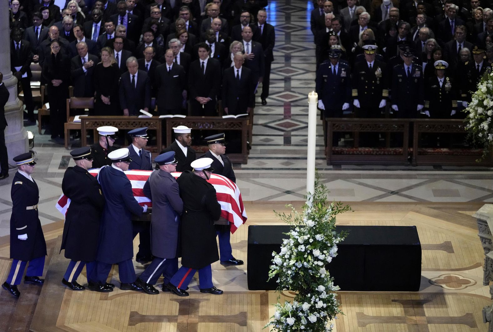 The flag-draped casket of former President Jimmy Carter arrives for a state funeral at Washington National Cathedral in Washington, DC, on January 9.