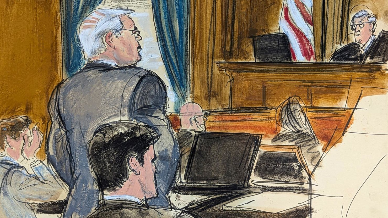 In this courtroom sketch, former Sen. Bob Menendez, left, gives his statement to Judge Sidney Stein, during his sentencing in Manhattan federal court, Wednesday, Jan. 29, 2025, in New York.