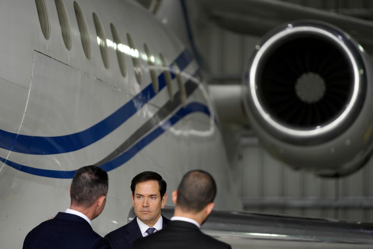 Secretary of State Marco Rubio stands by the Venezuelan government airplane he announced is being seized by the U.S. during a press conference at La Isabela International Airport in Santo Domingo, Dominican Republic, on February 6, 2025. 