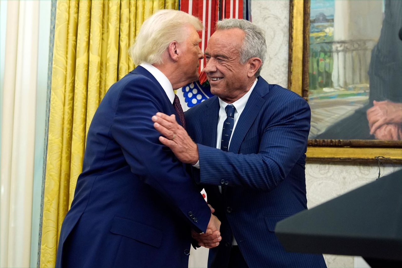 President Donald Trump congratulates Robert F. Kennedy Jr., after he was sworn in as Health and Human Services Secretary in the Oval Office at the White House, in Washington, DC, on February 13.