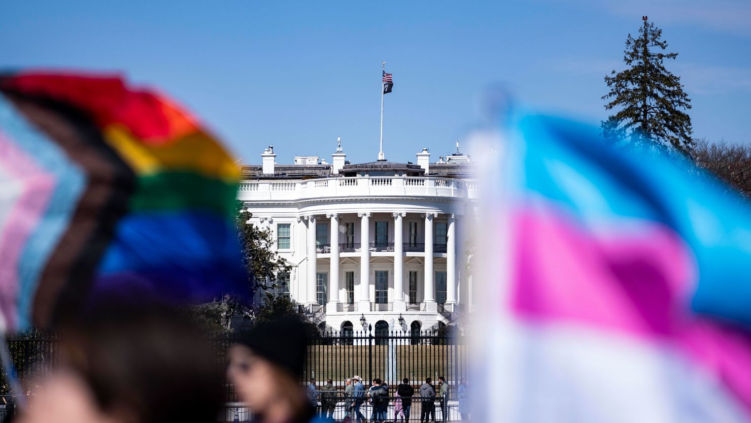 In this March 1 photo, people protest outside the White House in Washington, DC.