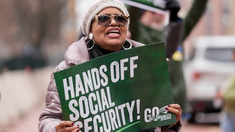 Demonstrators gather outside of the Edward A. Garmatz United States District Courthouse in Baltimore, Maryland, on March 14, before a hearing regarding the Department of Government Efficiency's access to Social Security data. 