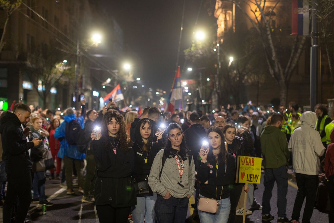 People use the lights on their cell phones as they observe fifteen minutes of silence during a major anti-corruption rally led by university students in Belgrade, Serbia, on March 15.