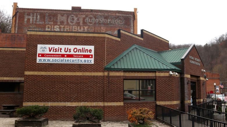 A sign outside a US Social Security Administration office in Welch, West Virginia, advertises its online services on March 20.