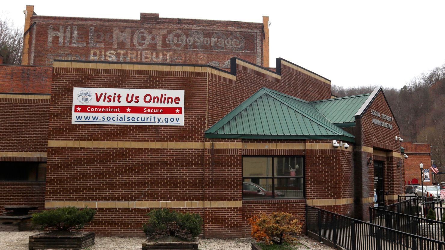 A sign outside a US Social Security Administration office in Welch, West Virginia, advertises its online services on March 20.