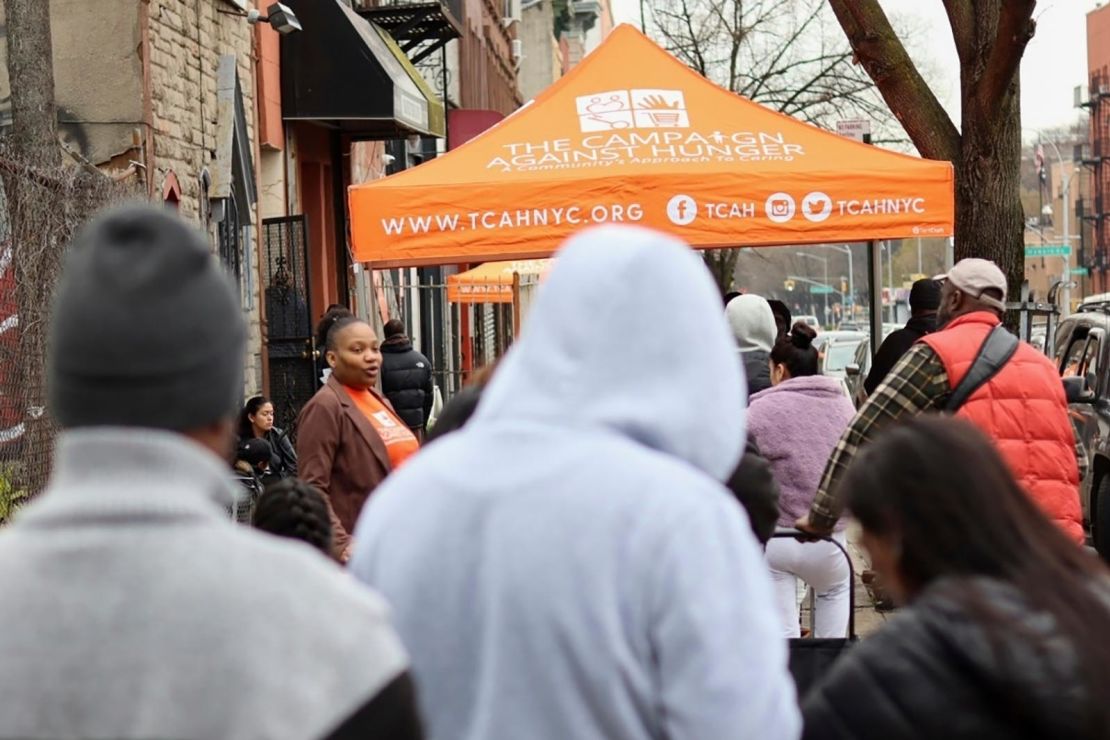 People line up for groceries outside The Campaign Against Hunger's distribution center in the Brooklyn borough of New York on April 15. 