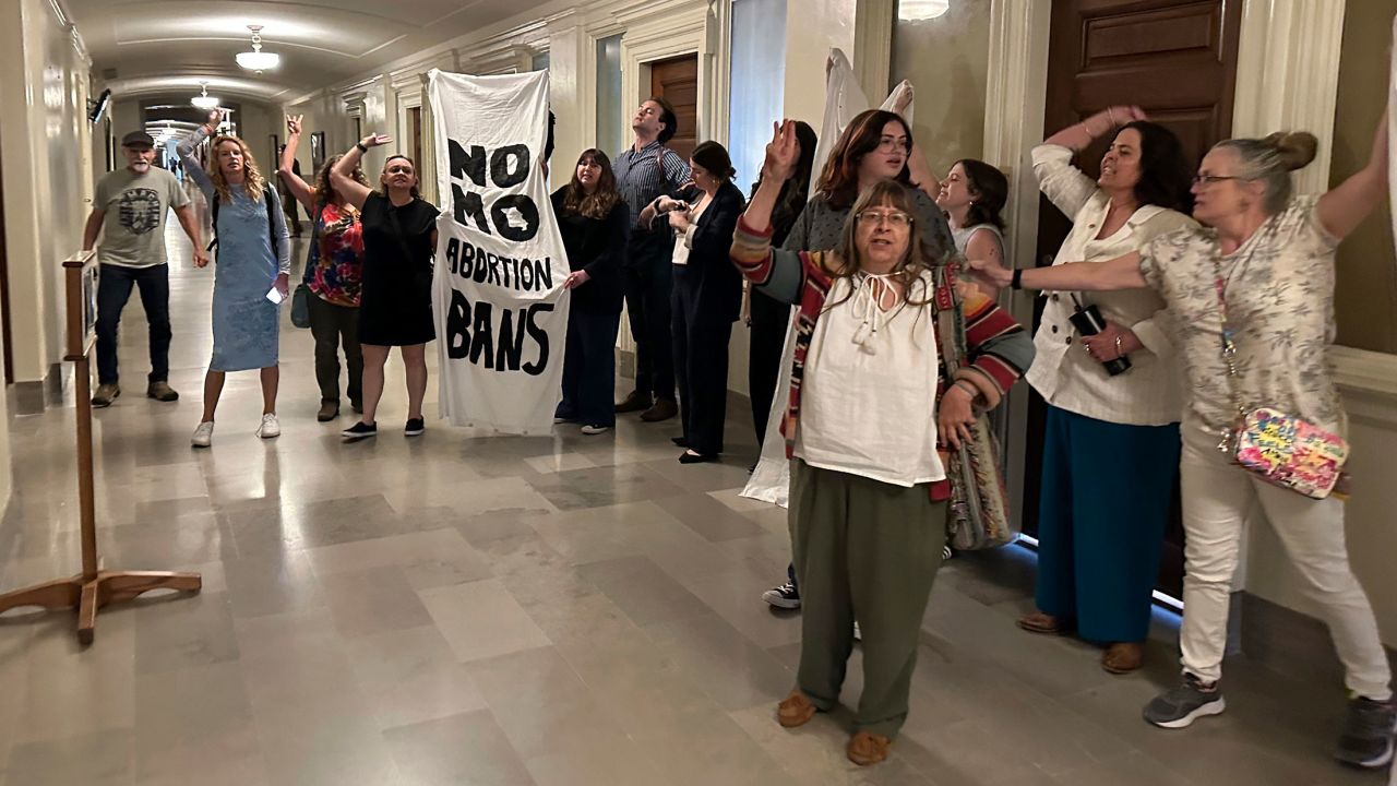 People in support of abortion rights protest outside the Missouri Senate chamber after the Senate voted to approve a referendum seeking to repeal an abortion-rights amendment on May 14 in Jefferson City, Missouri.