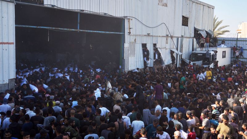 Hundreds of starving Palestinians storm Gaza food warehouse in deadly incident, says UN agency | CNN