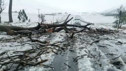 Snow covers the N2 road heading to Nolangeni, South Africa on June 10.