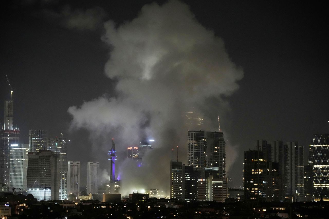 Smoke rises after a missile attack in Tel Aviv, Israel, on Friday, June 13.