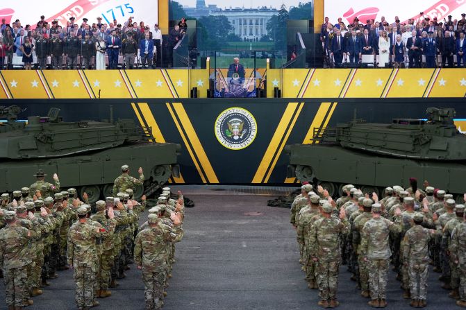 President Donald Trump participates in a reenlistment ceremony during the military celebration on Saturday.