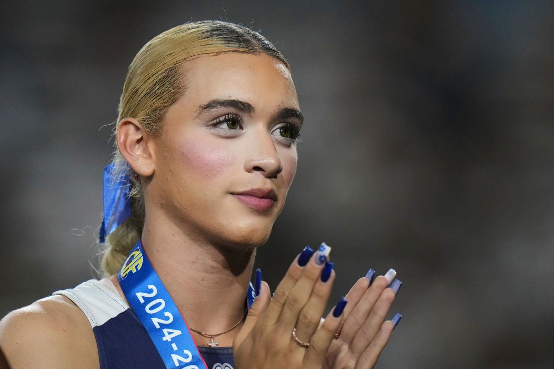 Hernandez stands on the podium during a medal ceremony for the triple jump at the California high school track-and-field championships in Clovis, California, on May 31.