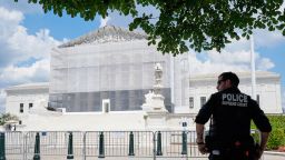 A US Supreme Court police officer stands watch outside of the Supreme Court on June 26 in Washington, DC.