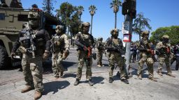 Federal agents stage at MacArthur Park on July 7 in in Los Angeles.