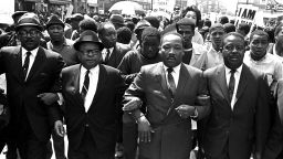 FILE - The Rev. Ralph Abernathy, right, and Bishop Julian Smith, left, flank Dr. Martin Luther King, Jr., during a civil rights march in Memphis, Tenn., March 28, 1968. (AP Photo/Jack Thornell, File)