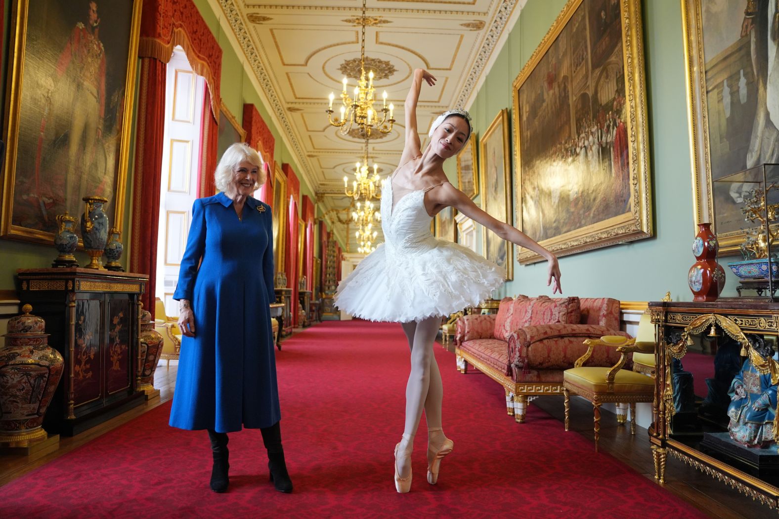 Britain’s Queen Camilla, patron of the English National Ballet, watches Sangeun Lee perform during a reception at Buckingham Palace in London on Wednesday, November 12.