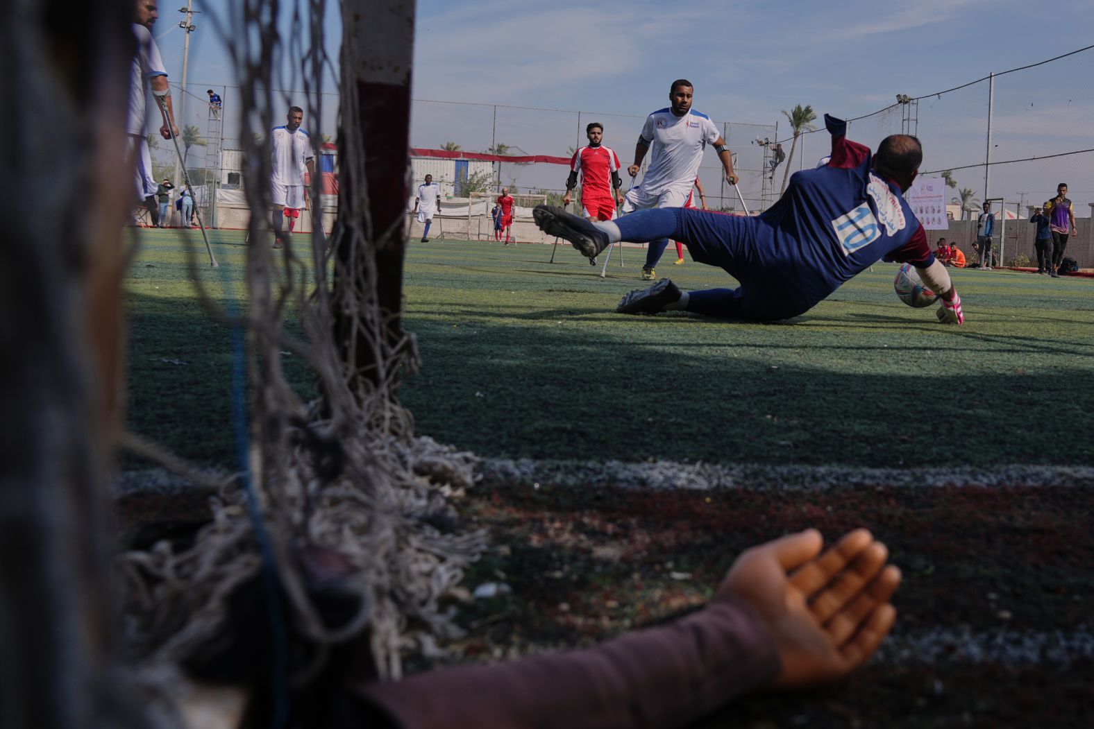 Palestinians, some of whom were injured in the Hamas-Israel conflict and some in previous conflicts, compete in a soccer tournament for amputees in Deir al-Balah, Gaza, on Monday, November 17.