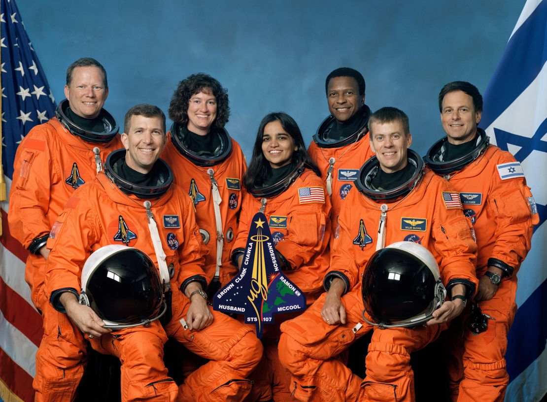 The STS-107 crew includes, from the left, Mission Specialist David Brown, Commander Rick Husband, Mission Specialists Laurel Clark, Kalpana Chawla and Michael Anderson, Pilot William McCool and Payload Specialist Ilan Ramon.