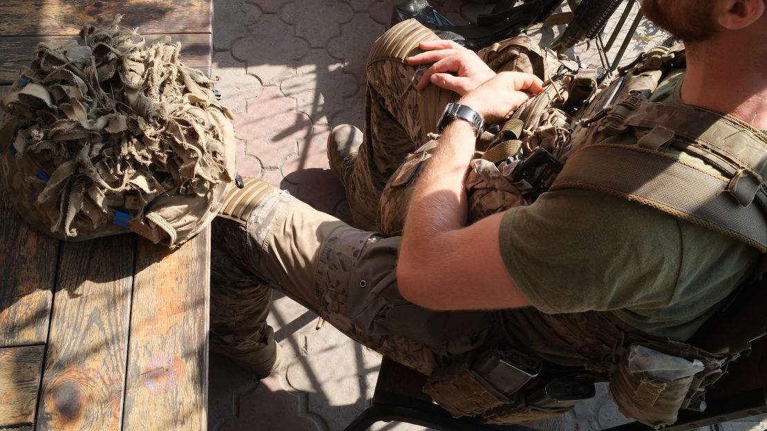 A group of Ukrainian soldiers rests after completing a long mission in Russia's Kursk region.