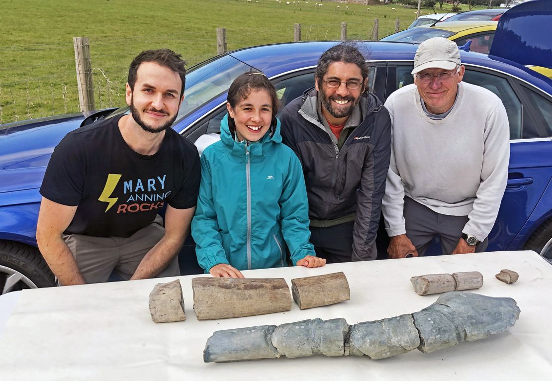 Dr. Dean Lomax, (from left) Ruby Reynolds, Justin Reynolds and Paul de la Salle are shown with the fossil discovery in 2020.
