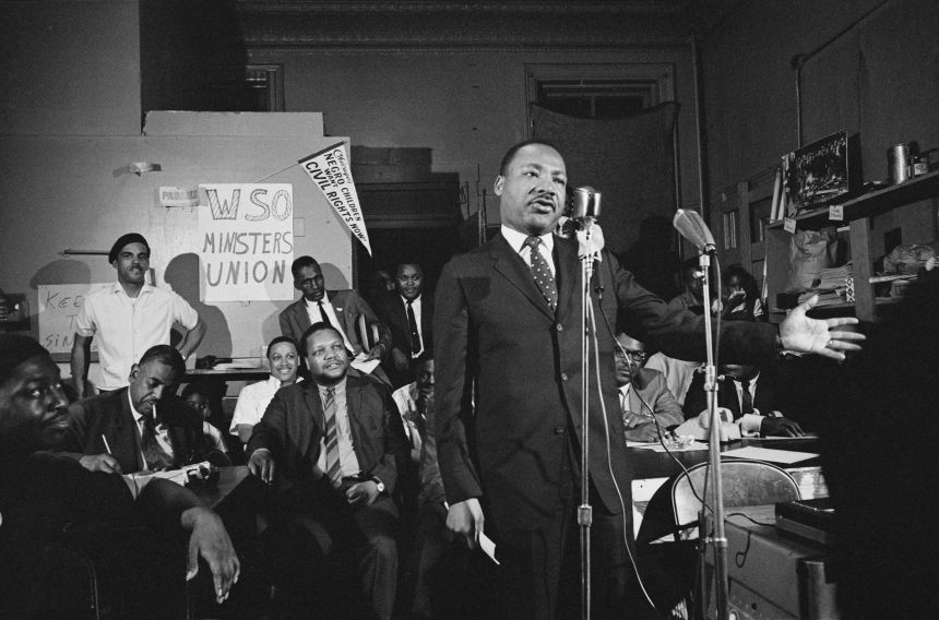 American civil rights activist Martin Luther King Jr. addresses a meeting in Chicago in May 1966.