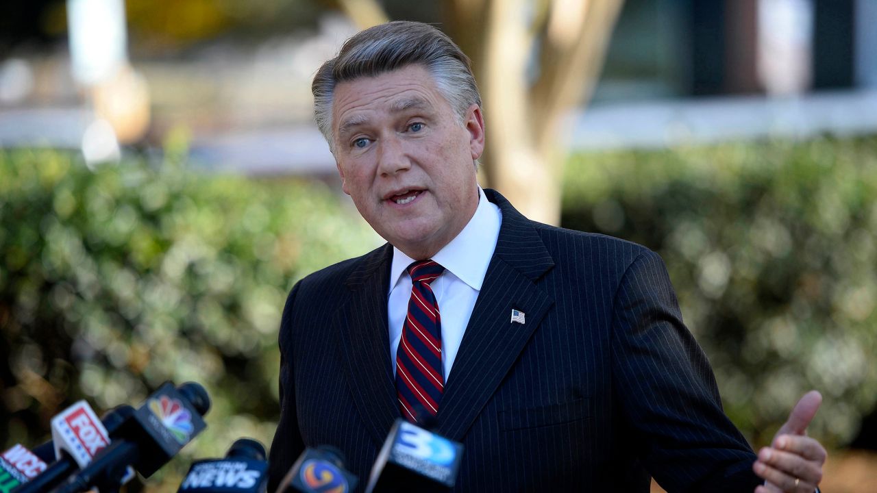 In this 2018 photo, Mark Harris answers questions at a news conference at the Matthews Town Hall in Matthews, North Carolina.