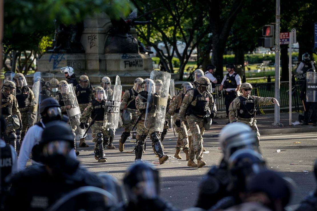 Military enforcements respond during a protest near Lafayette Park ahead of President Trump's trip to St. John's Church on June 1, 2020 in downtown Washington, DC. 