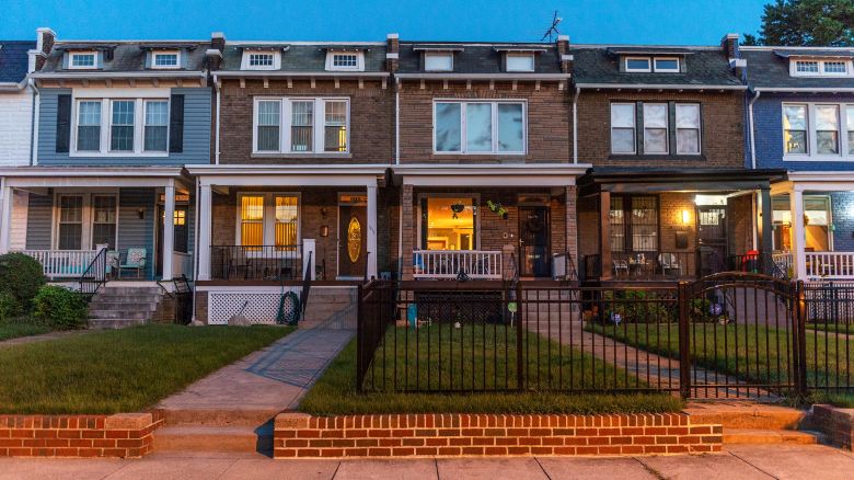 Row houses are seen at dusk in the Barney Circle neighborhood in Washington, DC, on August 30, 2020. 