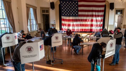 Voters cast their ballots at the old Stone School, used as a polling station, on election day in Hillsboro, Virginia on November 3, 2020.