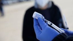 A healthcare worker prepares flu shots during a drive-thru clinic at the Louisiana State Fairgrounds in Shreveport, Louisiana, in November 2020. 