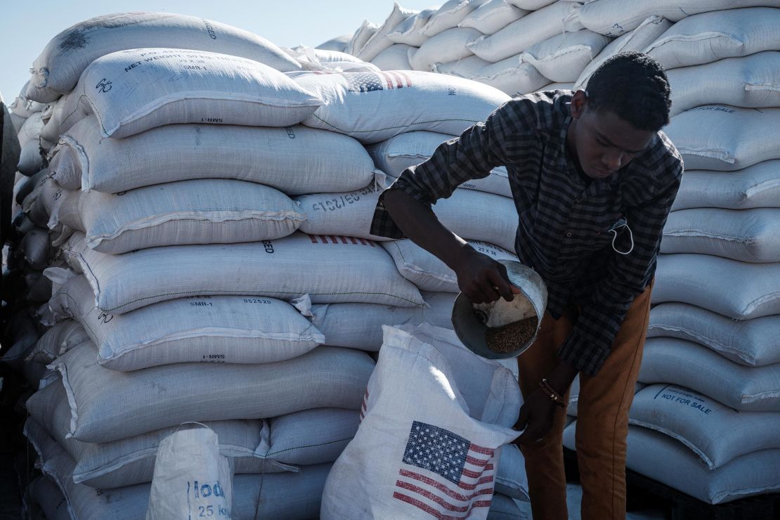 Food contributions from USAID are distributed to refugees who fled the Tigray conflict at a center near the Ethiopian border in Gedaref, eastern Sudan, on December 2, 2020.