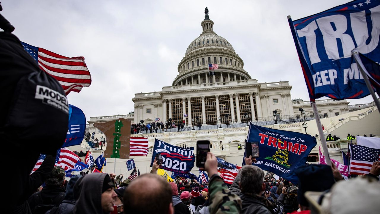 Pro-Trump supporters storm the US Capitol following a rally with President Donald Trump on January 6, 2021 in Washington, DC. 