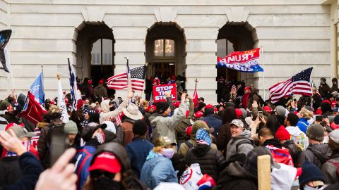 A pro-Trump mob floods into the Capitol Building after breaking into it on January 6, 2021 in Washington, DC.